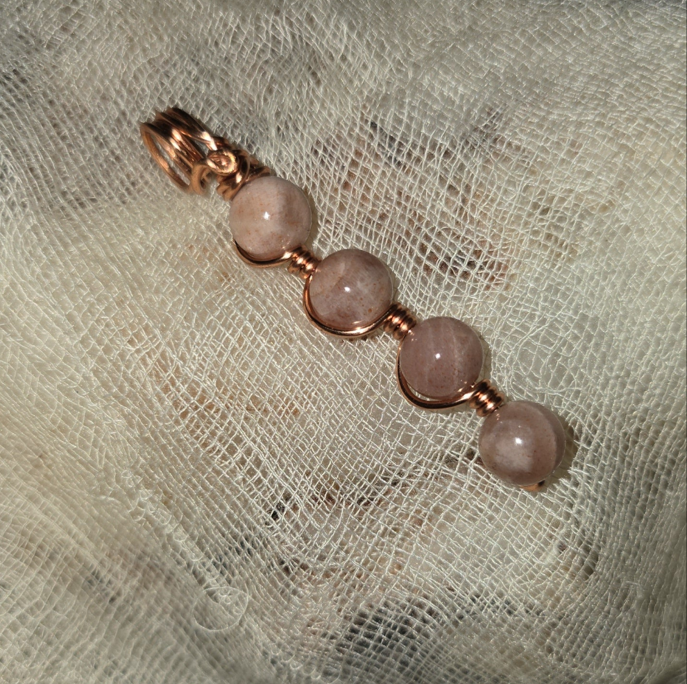 Radiant Sun Pendant – Sunstone & Copper Wire